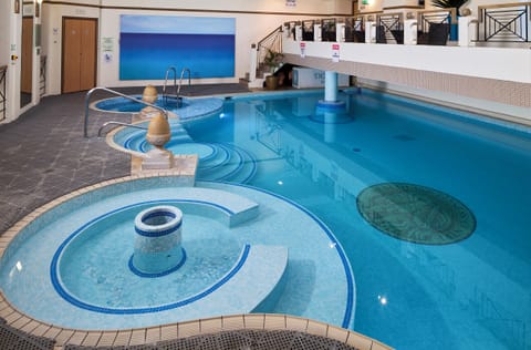 Indoor pool, open 8:00 AM to 6:00 PM, sun loungers