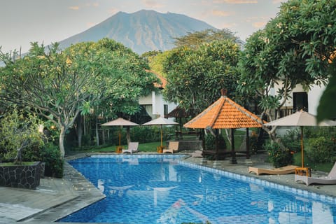 3 outdoor pools, open 7:00 AM to 9:00 PM, pool umbrellas, sun loungers