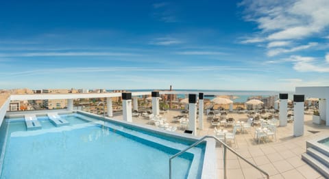 Outdoor pool, pool umbrellas, sun loungers