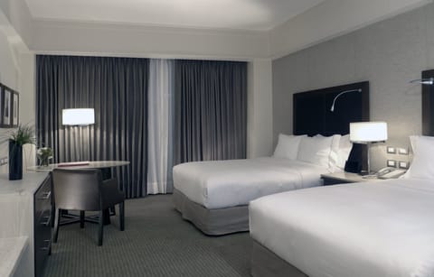 Premium bedding, down comforters, pillowtop beds, minibar