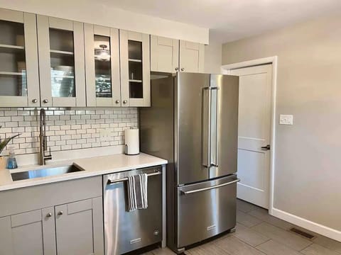 The kitchen has a full sized refrigerator and plenty of storage.  Kitchen amenities are provided.