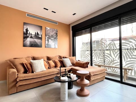 Apartment, 2 Bedrooms, Balcony | Living room | 42-inch flat-screen TV with satellite channels, streaming services