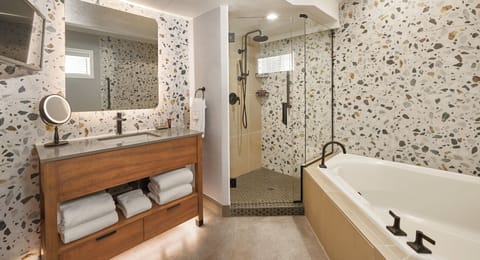 Oceanfront King Studio | Bathroom | Designer toiletries, hair dryer, slippers, towels