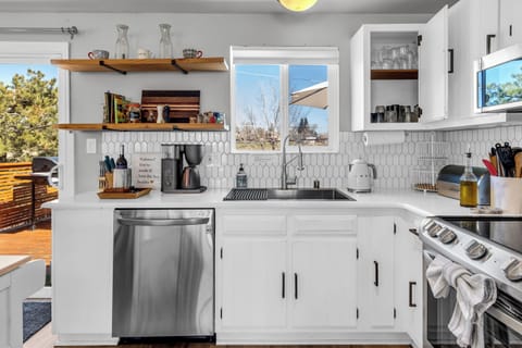 Kitchen with mountain views in the backyard.