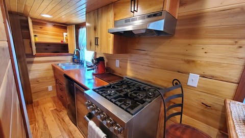 Pantry cabinet, under- counter fridge and freezer, microwave has been added.