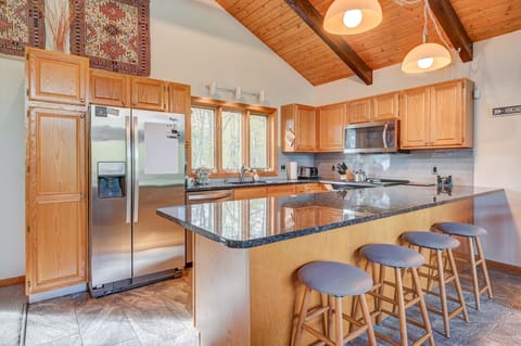 Open kitchen with new appliances and everything you need to entertain and cook.