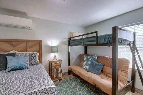 Queen bed and bunk bed