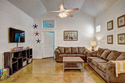 Spacious and cozy living room with TV and cable included