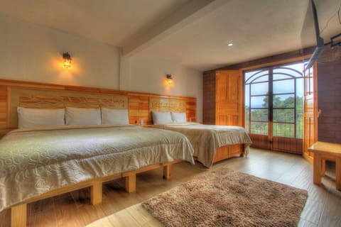 Grand Room | Premium bedding, memory foam beds, blackout drapes, iron/ironing board