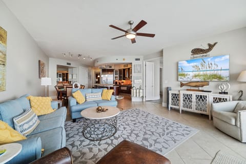 This thoughtfully designed living space maximizes natural light and integrates seamlessly with the surrounding environment. The open-concept layout and expansive windows create a bright and airy atmosphere.