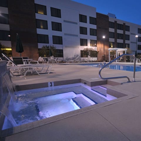 Outdoor pool, open 6:00 AM to 10:00 PM, pool umbrellas, sun loungers