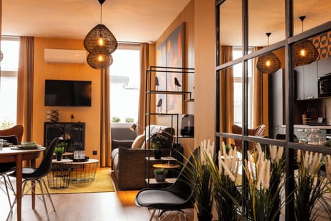 Superior Apartment | Living area | Flat-screen TV