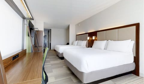 Suite, 2 Queen Beds | In-room safe, desk, iron/ironing board, free cribs/infant beds