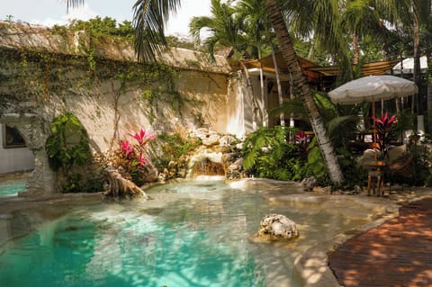 Outdoor pool, open 9:00 AM to 11:00 PM, pool umbrellas, sun loungers