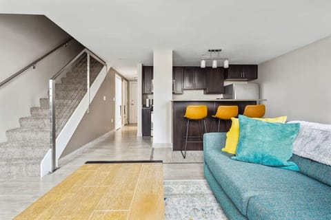 Colorful sofa and mini bar chairs