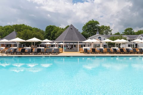 Seasonal outdoor pool, open 9:00 AM to 9:00 PM, free cabanas