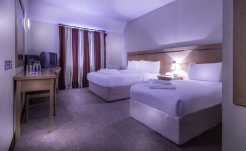 Individually decorated, desk, iron/ironing board, bed sheets