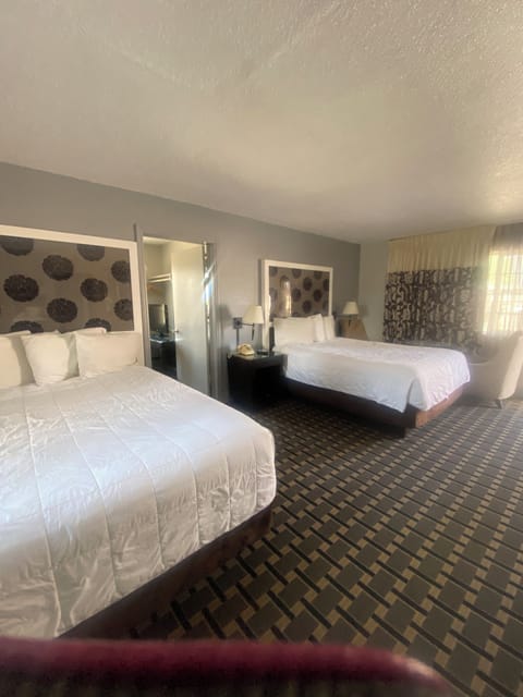 Family Room | Premium bedding, pillowtop beds, individually decorated