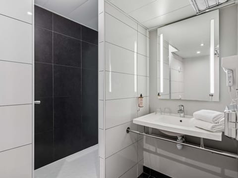 Eco-friendly toiletries, hair dryer, towels, soap