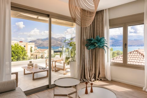 Panoramic Suite, 1 Bedroom, Sea View | Living area | TV