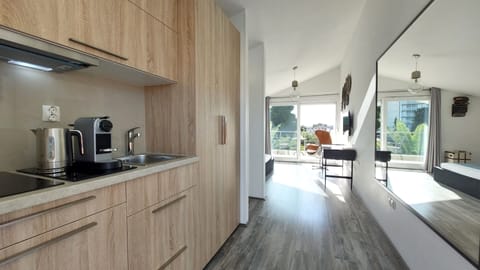 Premium Double Room, Balcony, Partial Sea View | Private kitchenette | Full-size fridge, stovetop, electric kettle, cookware/dishes/utensils