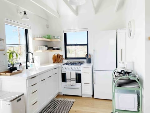 Save money by preparing your own meals in the kitchen!  The market is just a mile away.