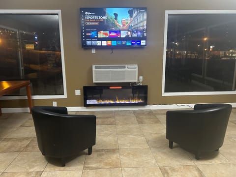 55-inch TV with cable channels, Netflix, Hulu