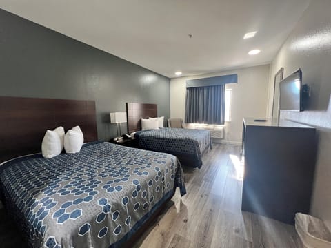 Standard Room, 2 Queen Beds, Non Smoking | Individually decorated, individually furnished, desk, laptop workspace