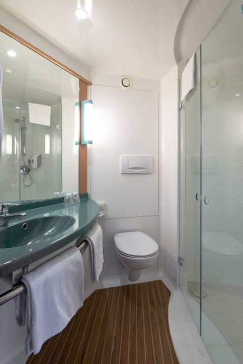 Shower, eco-friendly toiletries, hair dryer, towels
