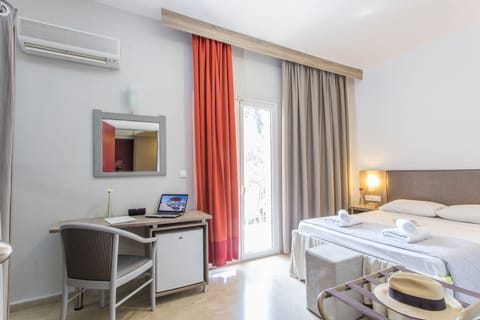 Economy Double Room, Balcony | In-room safe, desk, blackout drapes, soundproofing