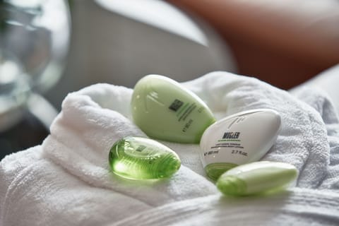 Shower, rainfall showerhead, designer toiletries, hair dryer