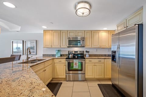 Fully equipped kitchen with granite countertops, stainless steel appliances, Keurig