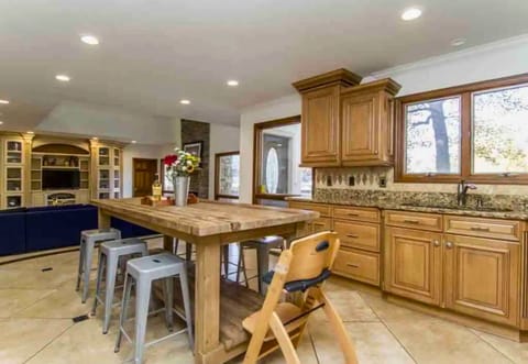 [Kitchen] The Island Offers Lots of Counter Space, Perfect for Cooking/Serving a Crowd and Has a High Chair so your Little Ones can Help Cook too!