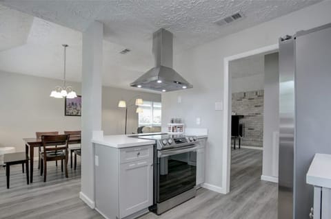 Standing in the Kitchen, Gazing into the Dining Room