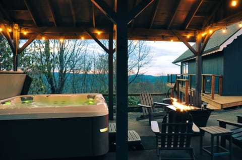 Bullfrog Premium Big Hot Tub under roof: NEW Feb '24! Propane Fire Pit Table & Adirondack Chairs, Hammock, Outdoor Dining Table & Chairs, Outdoor Games: Cornhole, Giant Jenga, Giant Connect Four!