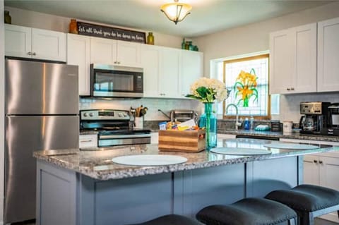 Kitchen. Hand Mixer. Coffee pot/ K cups. Crock pot. Blender. Appliances