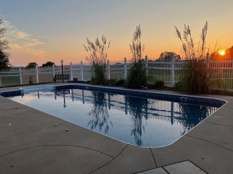 Sunsets & Serenity – Unwind by the pool with breathtaking golf course views.