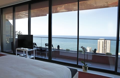 Junior Suite, Sea View, Sea Facing | Minibar, in-room safe, desk, blackout drapes