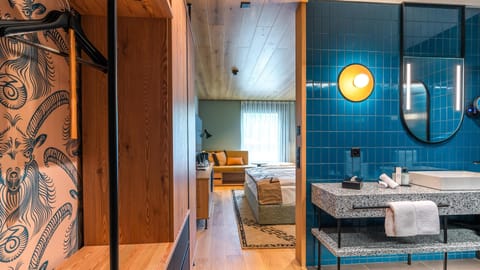 Design Double Room | Bathroom | Shower, rainfall showerhead, hair dryer, bathrobes