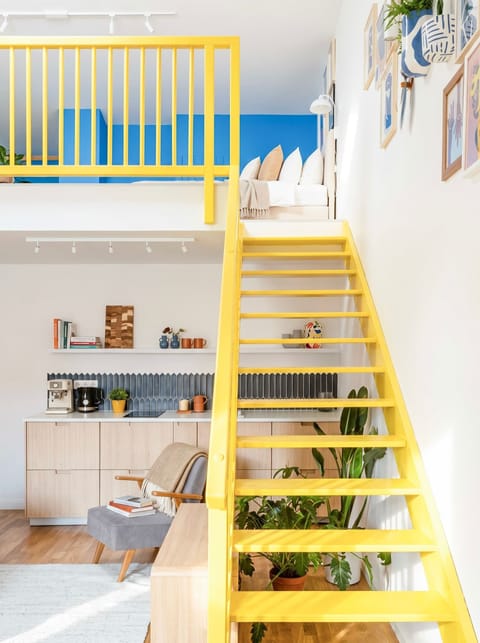 Stairs from lower to the upper level of the apartment