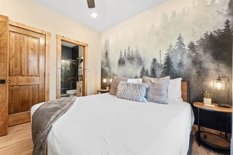 Discover the ultimate escape in our master king suite on the main level. 