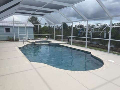 Awesome covered pool on the canal.   