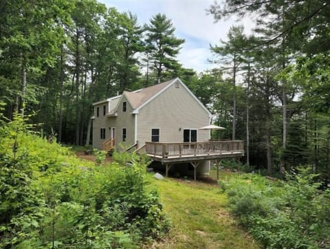 South and back side of house with large deck off the Great Room.