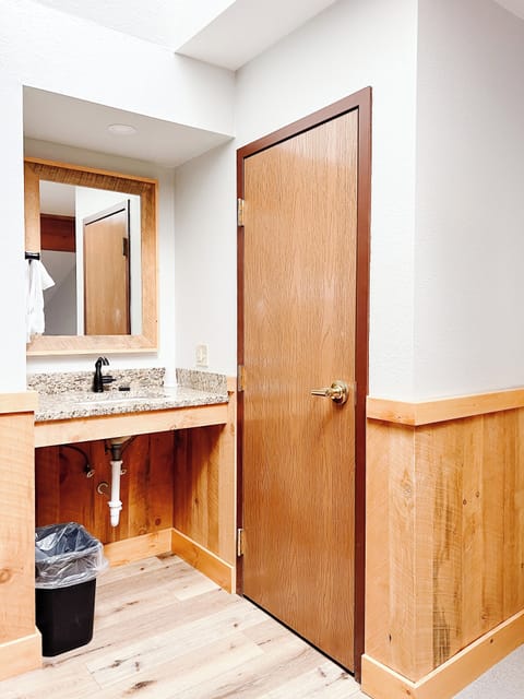 Pillowtop beds, desk, blackout drapes, iron/ironing board