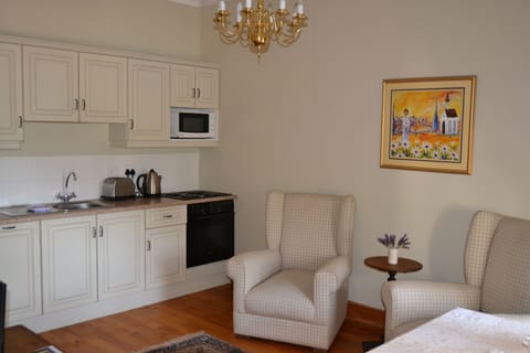 Luxury Honeymoon Suites | Private kitchen | Coffee/tea maker, electric kettle, highchair