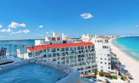 #334 - Penthouse Combo - 8 bedrooms, 7 baths sleeps 18 Penthouse 1 of 2:  Enjoy Spectacular Views in the Privacy &amp; Comfort of your own place.  The 4 Person Hot Tub is an Amazing Touch!  In Cancun, you have the Ocean on one side &amp; the Freshwater Lagoon on
