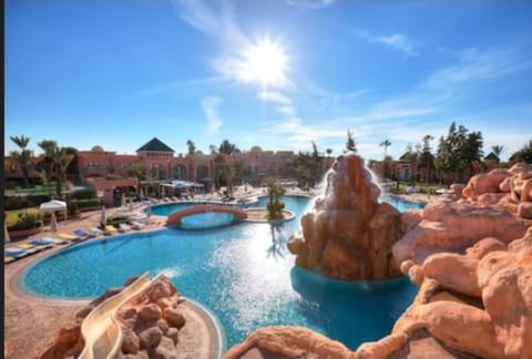 Indoor pool, outdoor pool, pool umbrellas, sun loungers
