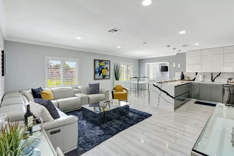 Living Room | lends a warm welcome and flows into the luxurious kitchen