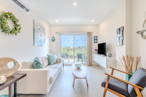 Enjoy a pleasant movie night in this elegant environment by taking a seat on the plush sofa with the warm Caribbean Breeze