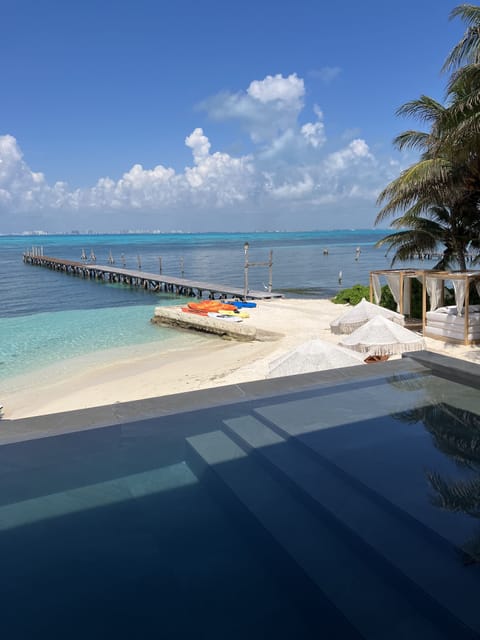 Outdoor pool, open 8:00 AM to 7:00 PM, sun loungers